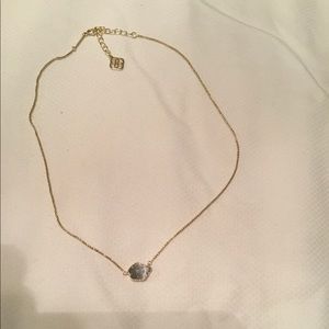 Kendra Scott necklace.